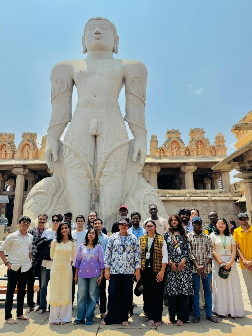 International students at the Bahubali statue, Shravanabelagola